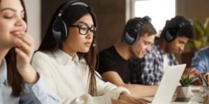 a group of people wearing headphones